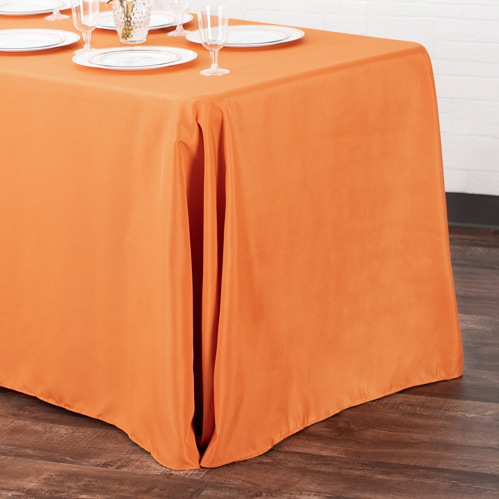 https://cdn.shopify.com/s/files/1/0042/0390/5136/products/90x132-Rectangular-Oblong-Premium-Polyester-Tablecloth-Burnt-Orange-side-view.jpg?v=1779385833