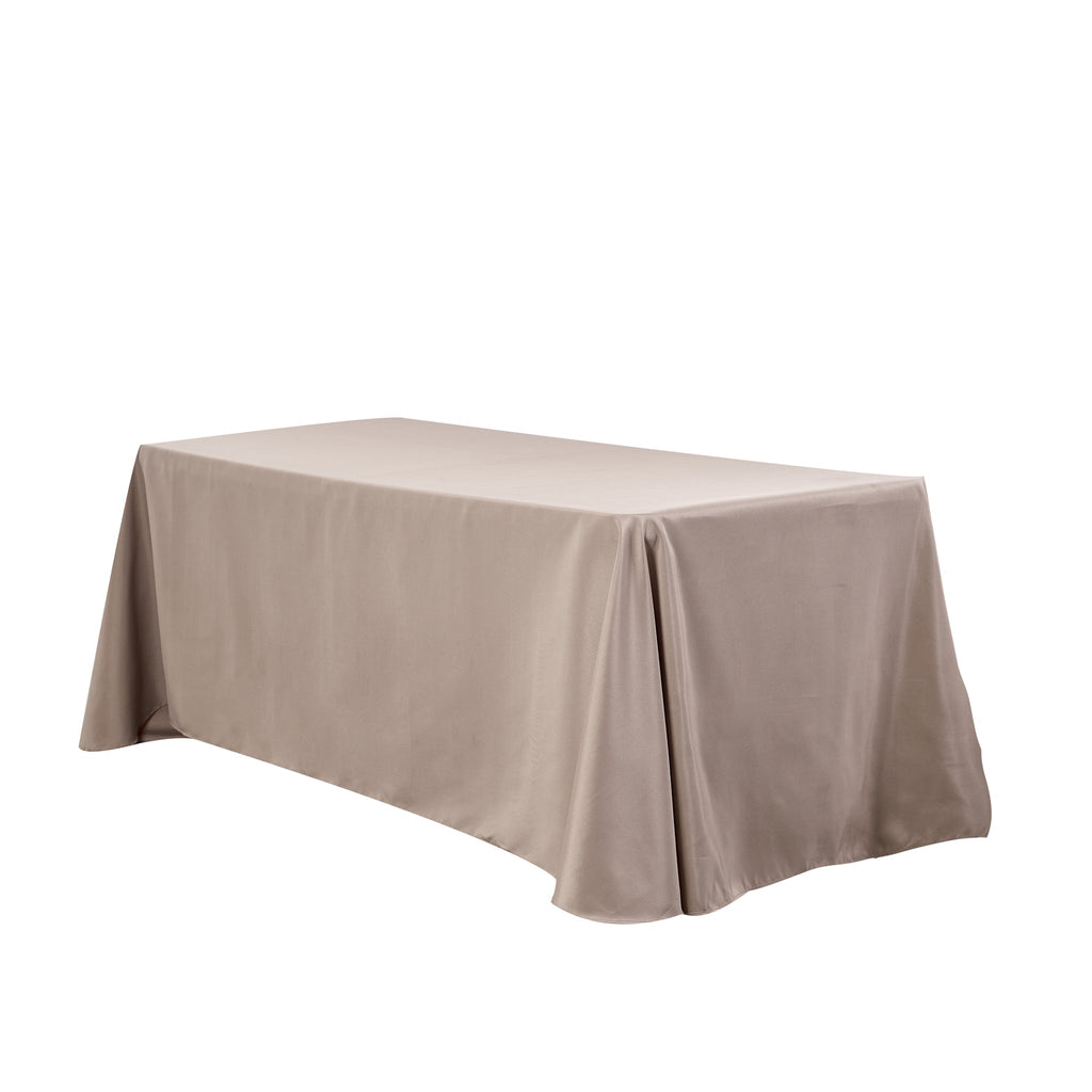 https://cdn.shopify.com/s/files/1/0042/0390/5136/files/90x132-Rectangular-Oblong-Premium-Polyester-Tablecloth-Taupe-angled-view_jpg.jpg?v=1765466505