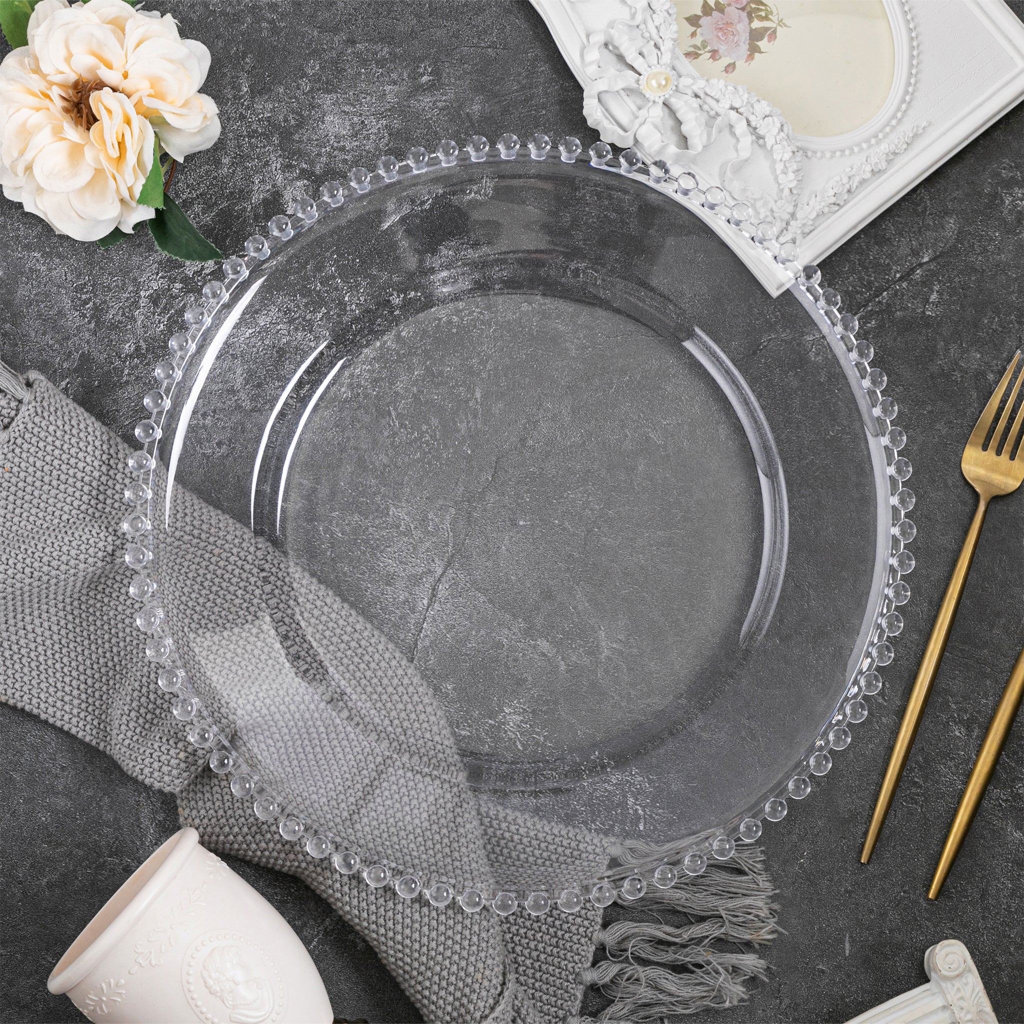 https://cdn.shopify.com/s/files/1/0042/0390/5136/files/Acrylic-Beaded-13-Round-Charger-Plate-Clear-2.jpg?v=1744805389