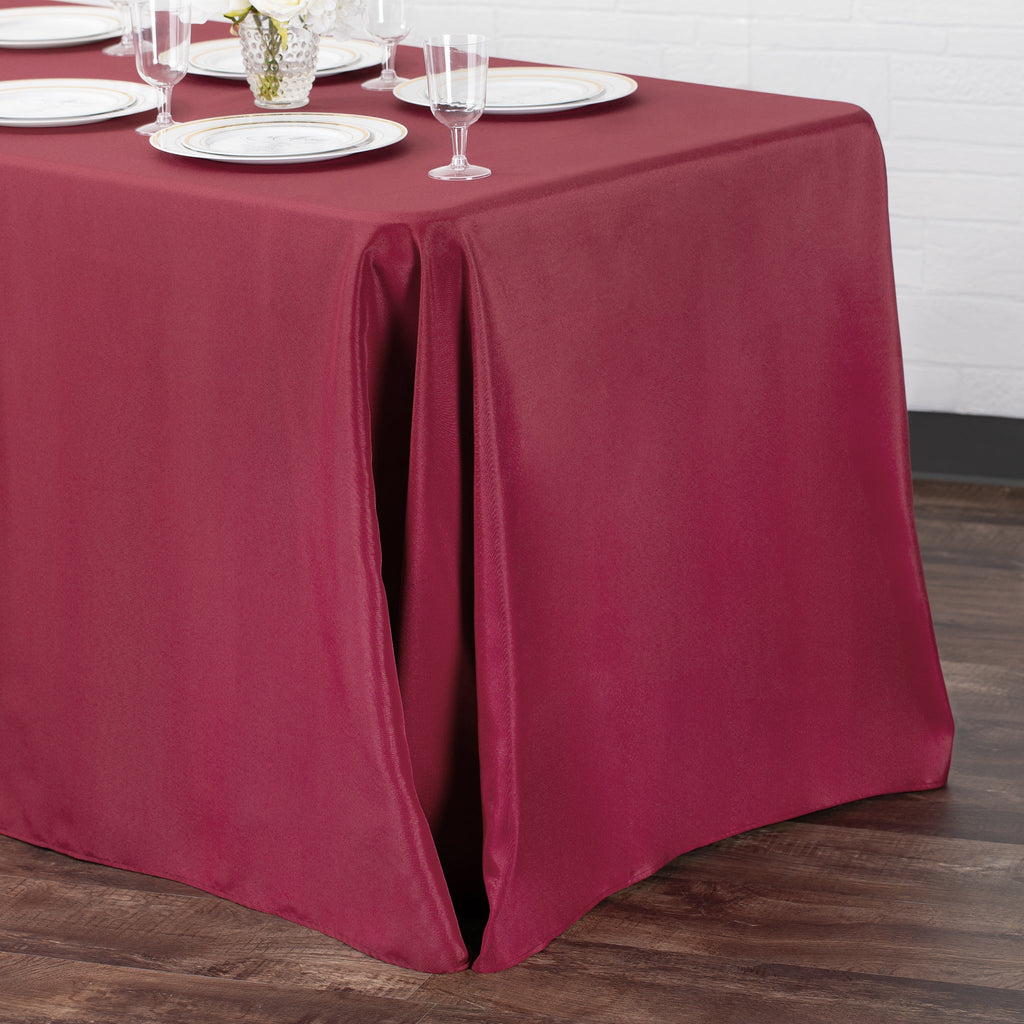 https://cdn.shopify.com/s/files/1/0042/0390/5136/products/Polyester-Rectangular-Tablecloth-Burgundy-Env.jpg?v=1744751203
