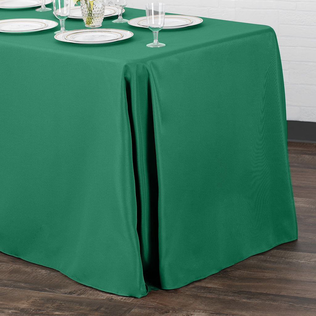 https://cdn.shopify.com/s/files/1/0042/0390/5136/products/Polyester-Rectangular-Tablecloth-Emerald-Green-Env.jpg?v=1744751125