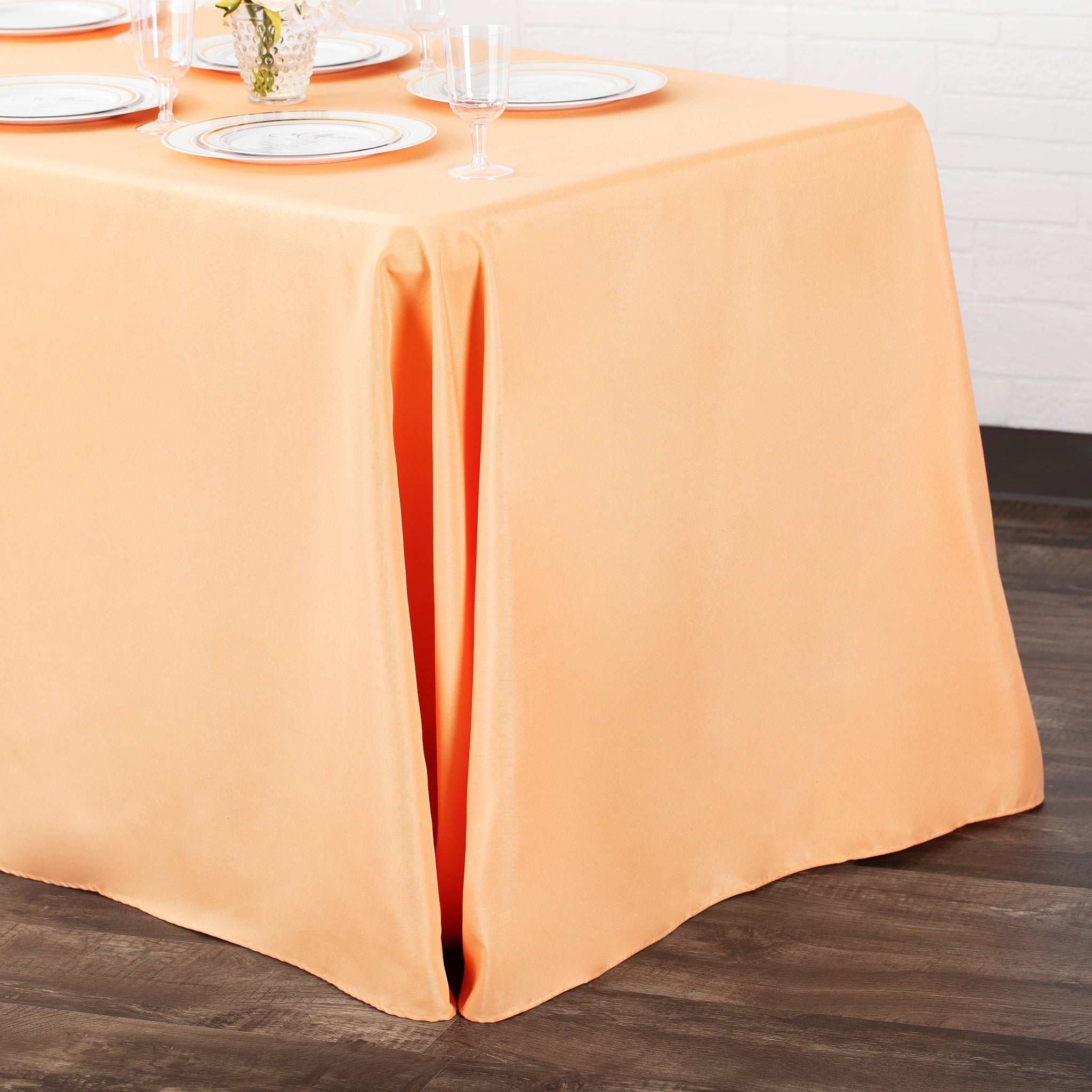 https://cdn.shopify.com/s/files/1/0042/0390/5136/products/Polyester-Rectangular-Tablecloth-Peach-Env.jpg?v=1744751288