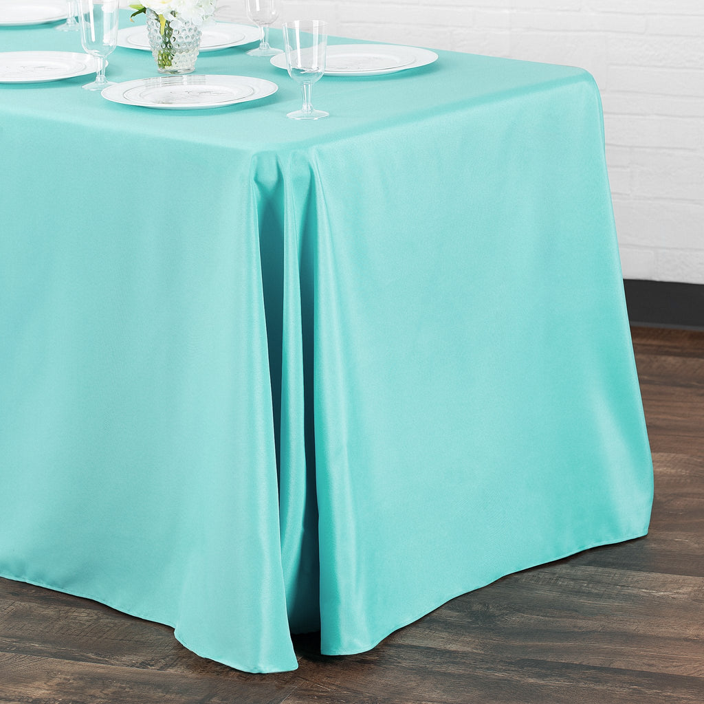 https://cdn.shopify.com/s/files/1/0042/0390/5136/products/Polyester-Rectangular-Tablecloth-Turquoise-Env.jpg?v=1744751005