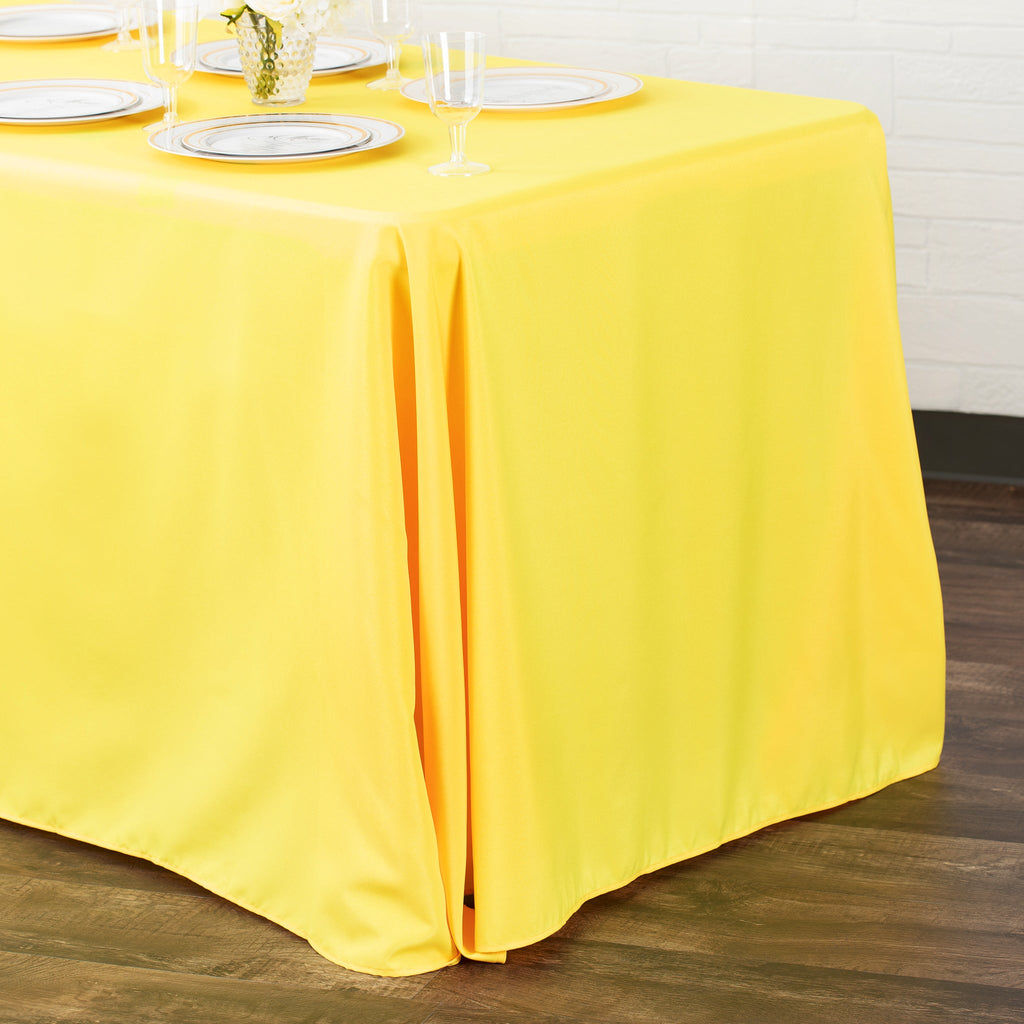 https://cdn.shopify.com/s/files/1/0042/0390/5136/products/Polyester-Rectangular-Tablecloth-Yellow-Env.jpg?v=1744751076