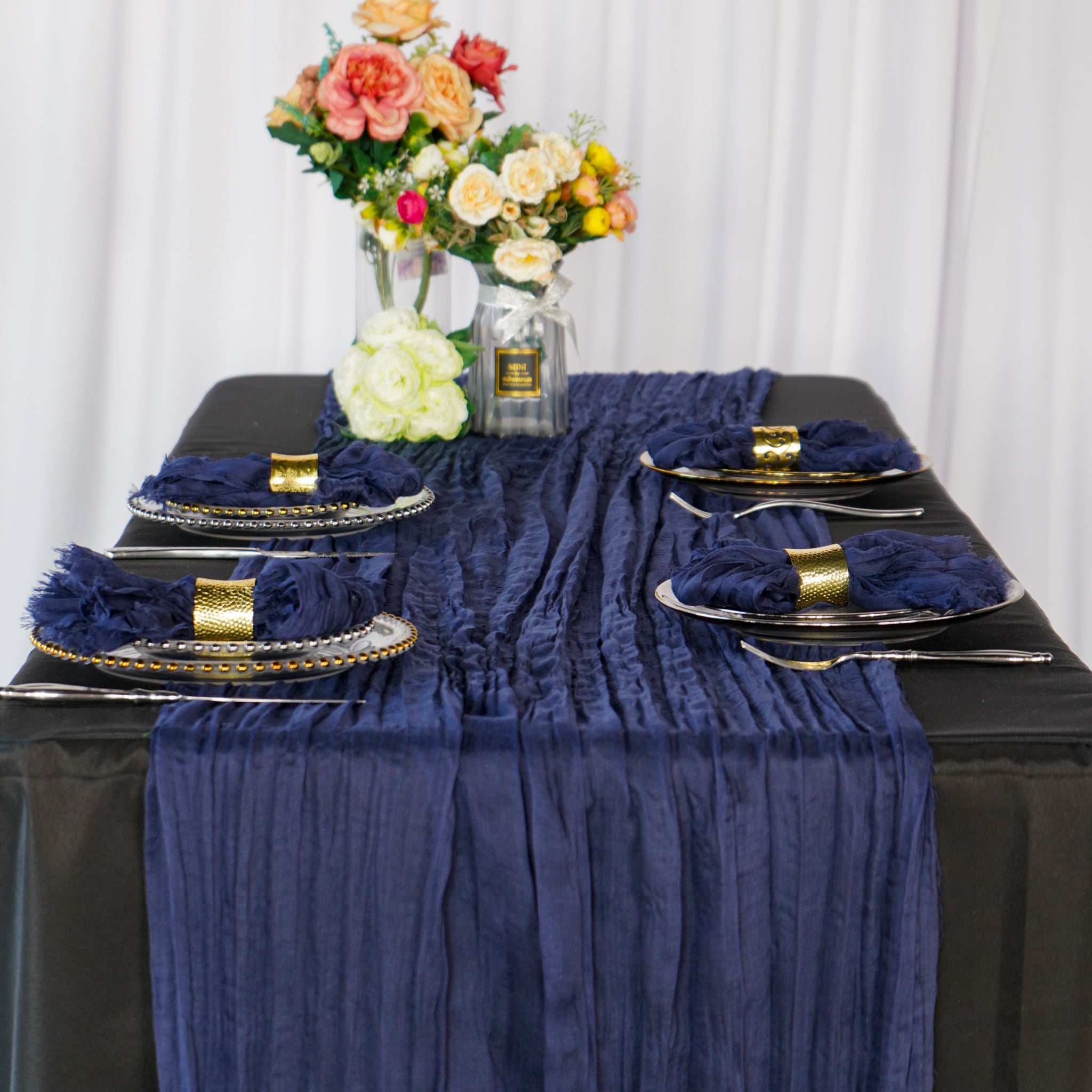 https://cdn.shopify.com/s/files/1/0042/0390/5136/products/PremiumCheeseclothTableRunner16FTx25_-NavyBlue.jpg?v=1668460559
