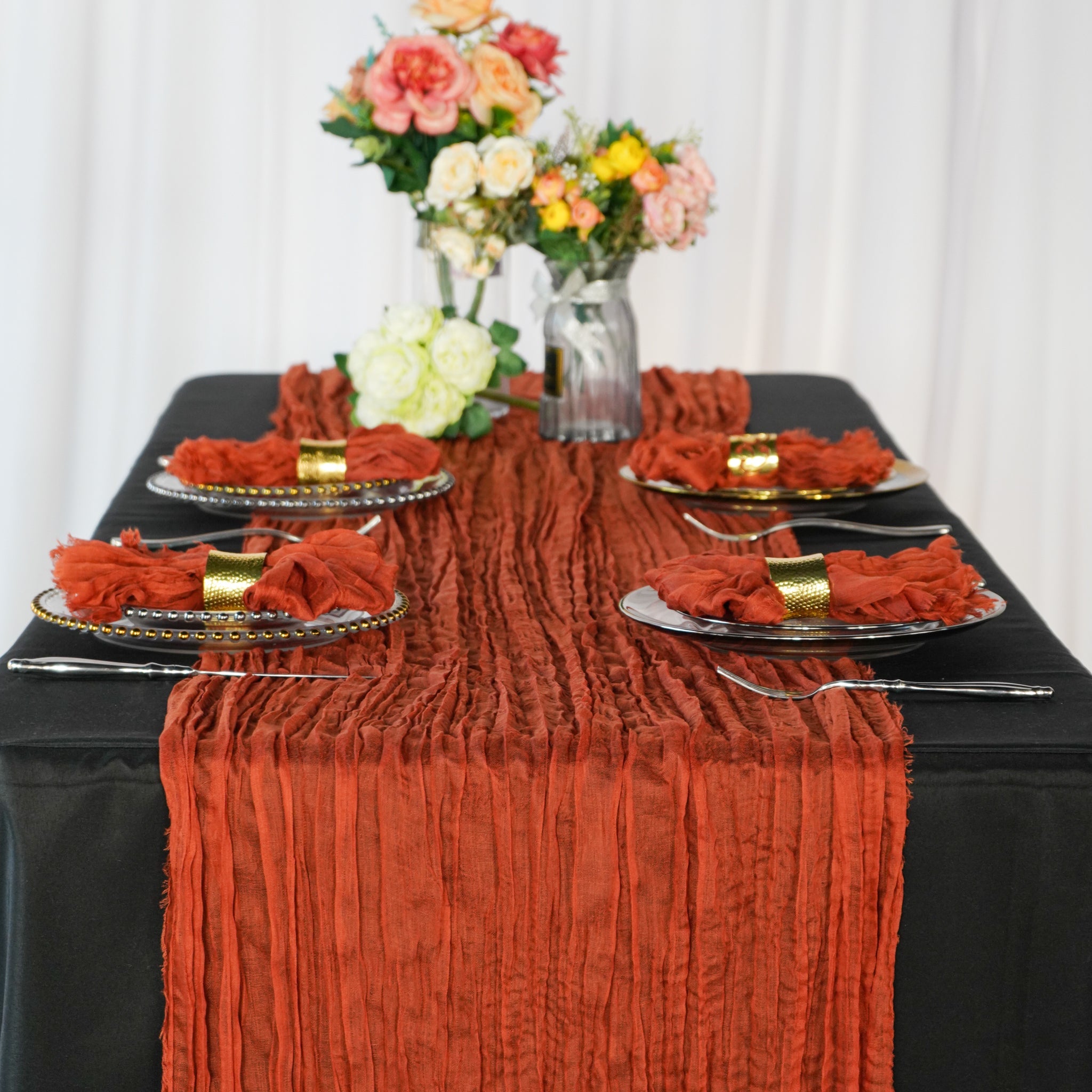 https://cdn.shopify.com/s/files/1/0042/0390/5136/products/PremiumCheeseclothTableRunner16FTx25_-Rust.jpg?v=1668459490