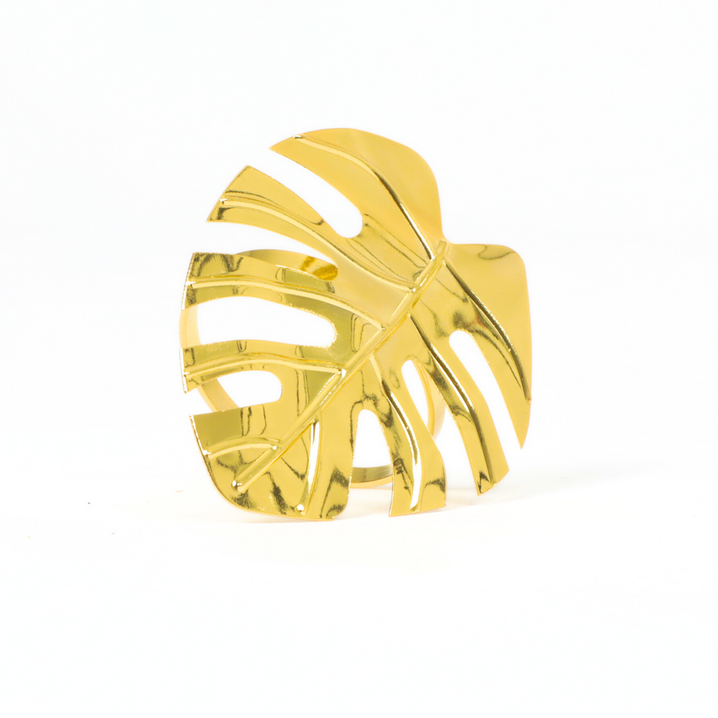 https://cdn.shopify.com/s/files/1/0042/0390/5136/files/gold-monstera-leaf-napkin-ring.png?v=1744293069