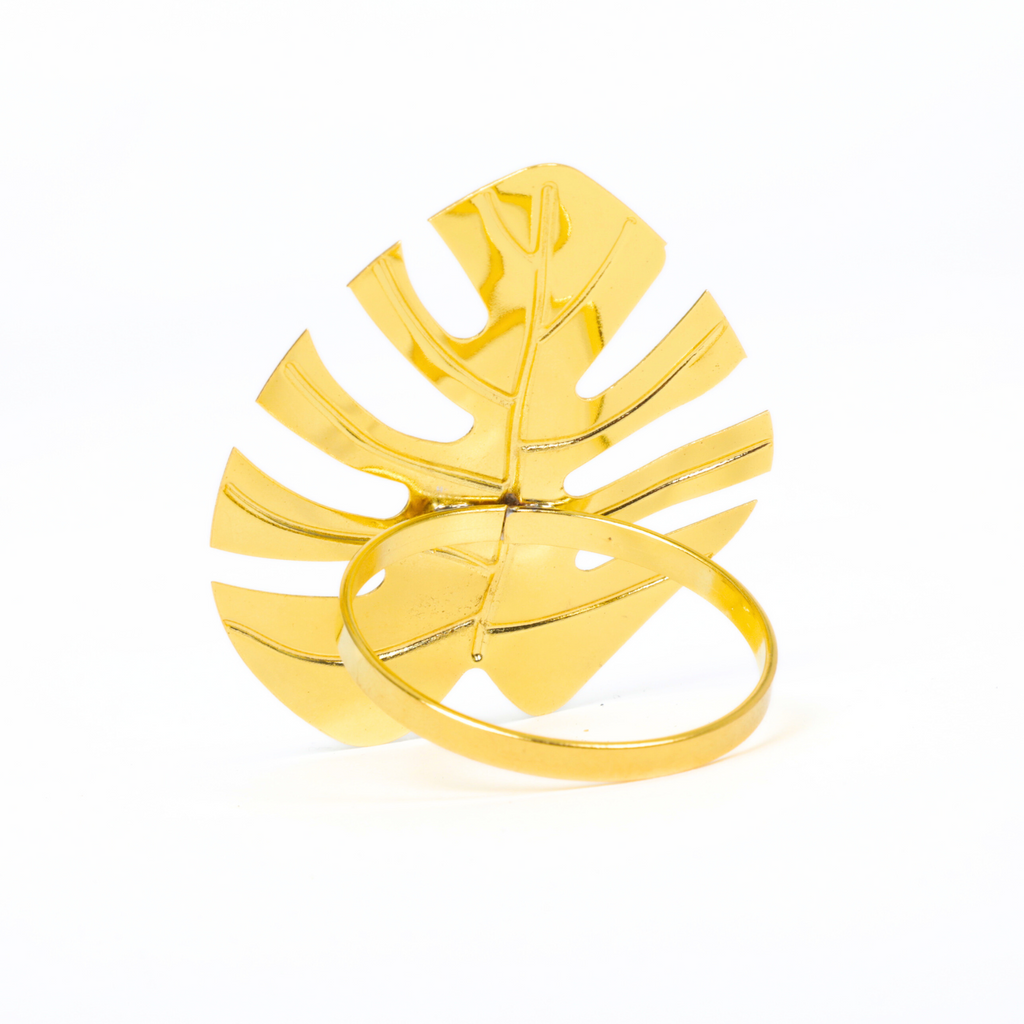 https://cdn.shopify.com/s/files/1/0042/0390/5136/files/gold-monstera-leaf-napkin-ring3.png?v=1744293067