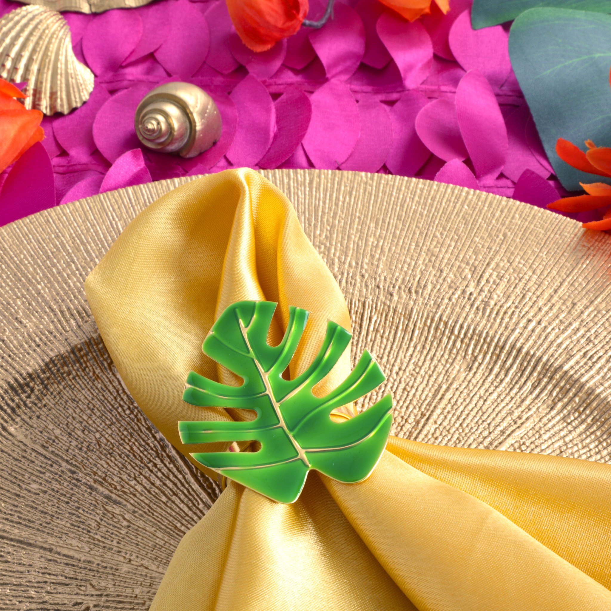 https://cdn.shopify.com/s/files/1/0042/0390/5136/files/green-monstera-leaf-napkin-ring.png?v=1772119802