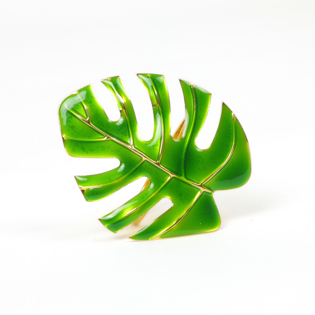 https://cdn.shopify.com/s/files/1/0042/0390/5136/files/green-monstera-leaf-napkin-ring2.png?v=1712850940