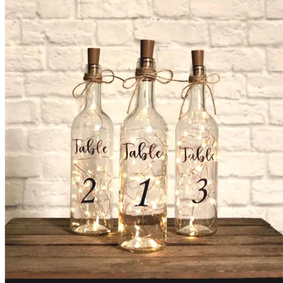 Lighted bottle table number
