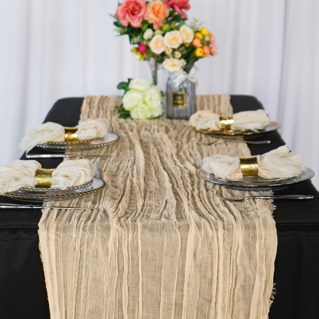 https://cdn.shopify.com/s/files/1/0042/0390/5136/products/premium-cheesecloth-table-runner-champagne1.jpg?v=1668459950