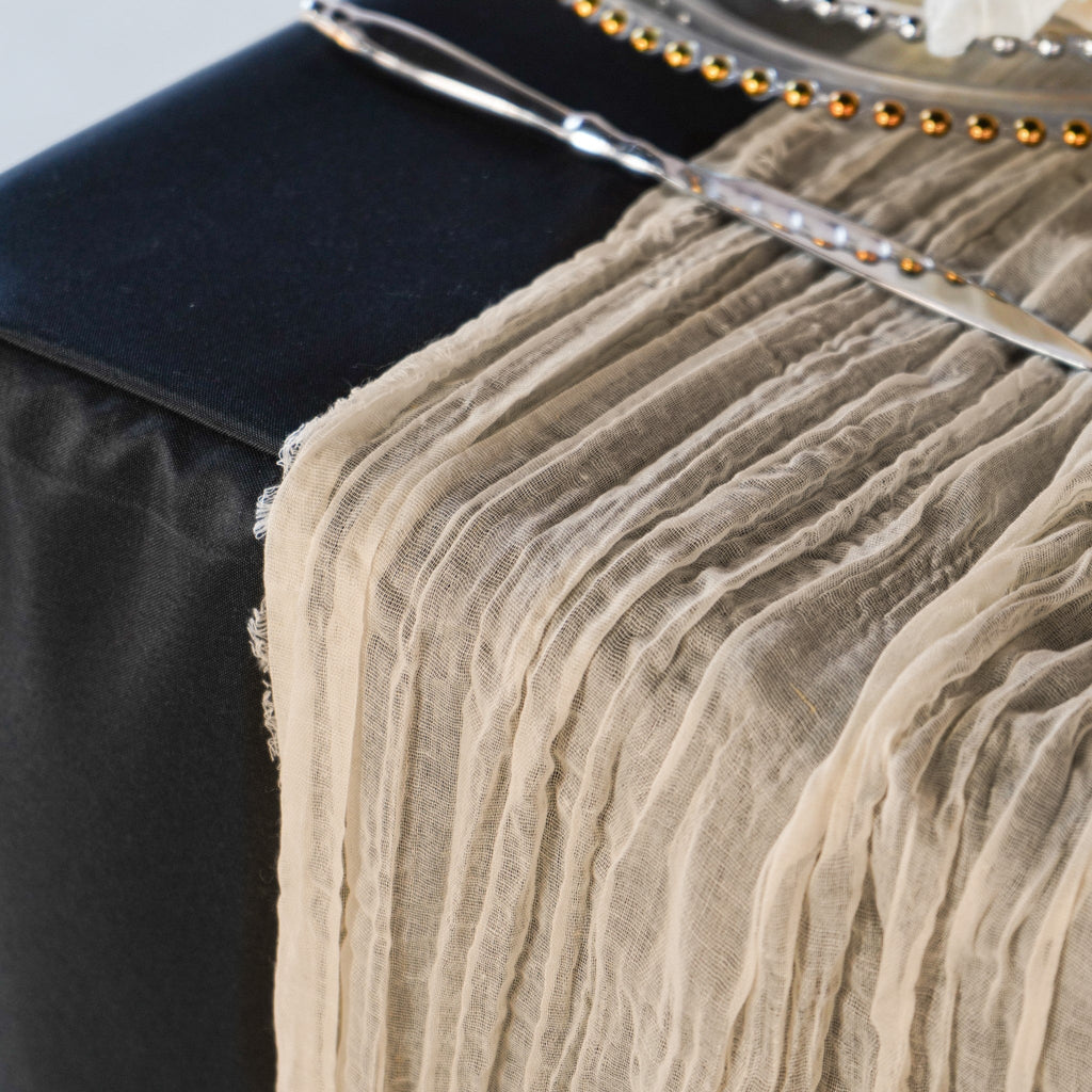 https://cdn.shopify.com/s/files/1/0042/0390/5136/products/premium-cheesecloth-table-runner-champagne2.jpg?v=1744687564