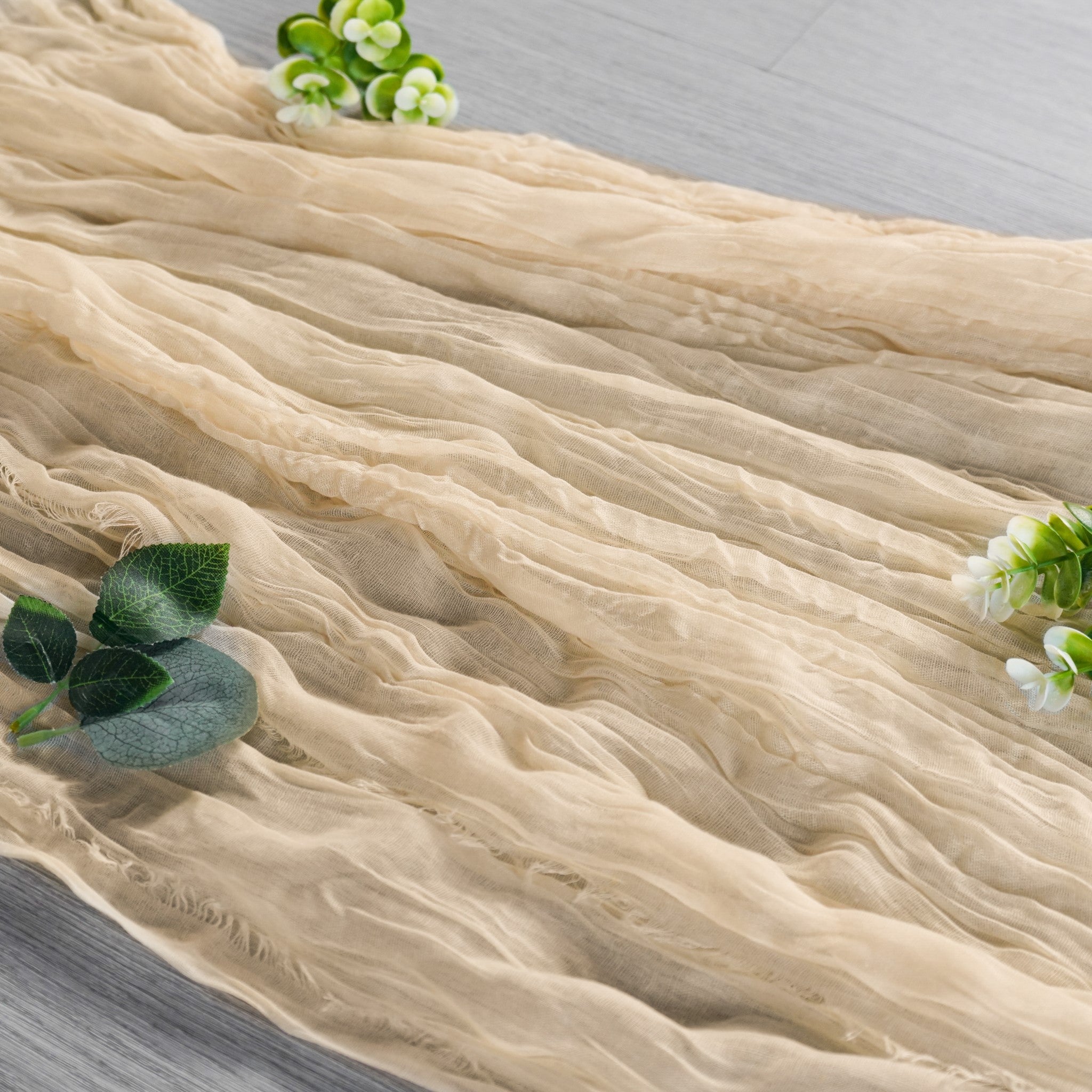 https://cdn.shopify.com/s/files/1/0042/0390/5136/products/premium-cheesecloth-table-runner-champagne3.jpg?v=1744687564