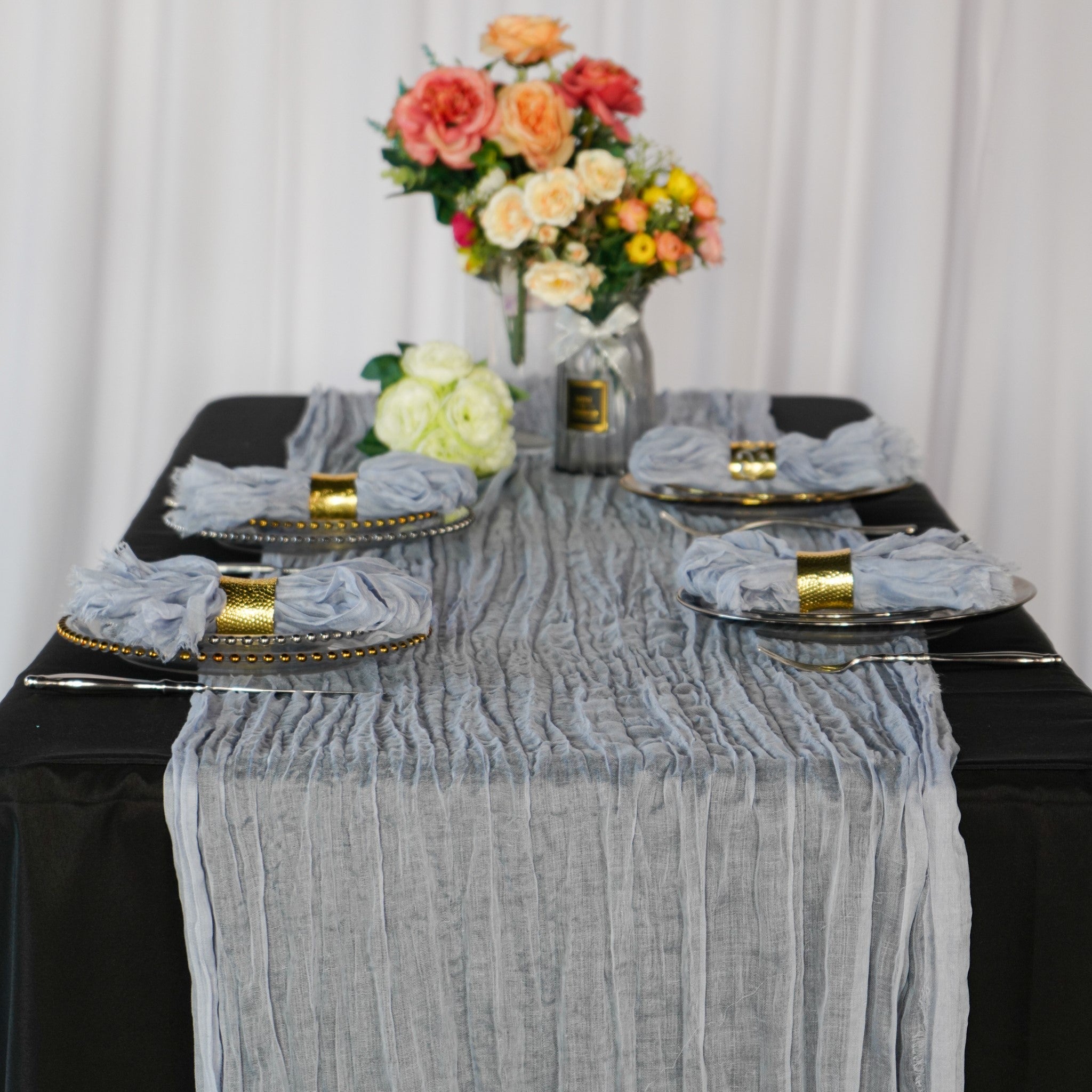 https://cdn.shopify.com/s/files/1/0042/0390/5136/products/premium-cheesecloth-table-runner-dusty-blue.jpg?v=1668461108