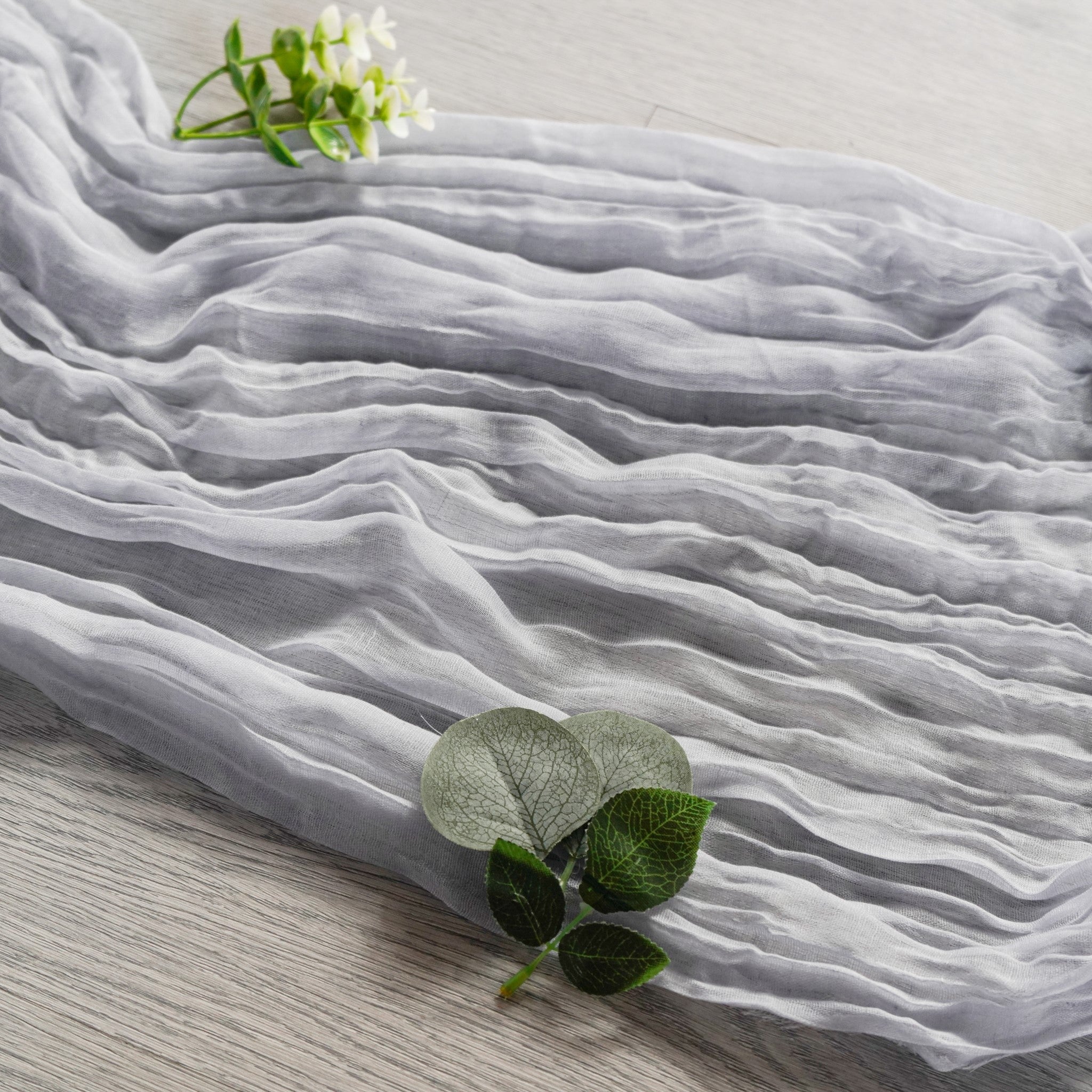 https://cdn.shopify.com/s/files/1/0042/0390/5136/products/premium-cheesecloth-table-runner-dusty-blue3.jpg?v=1774993798