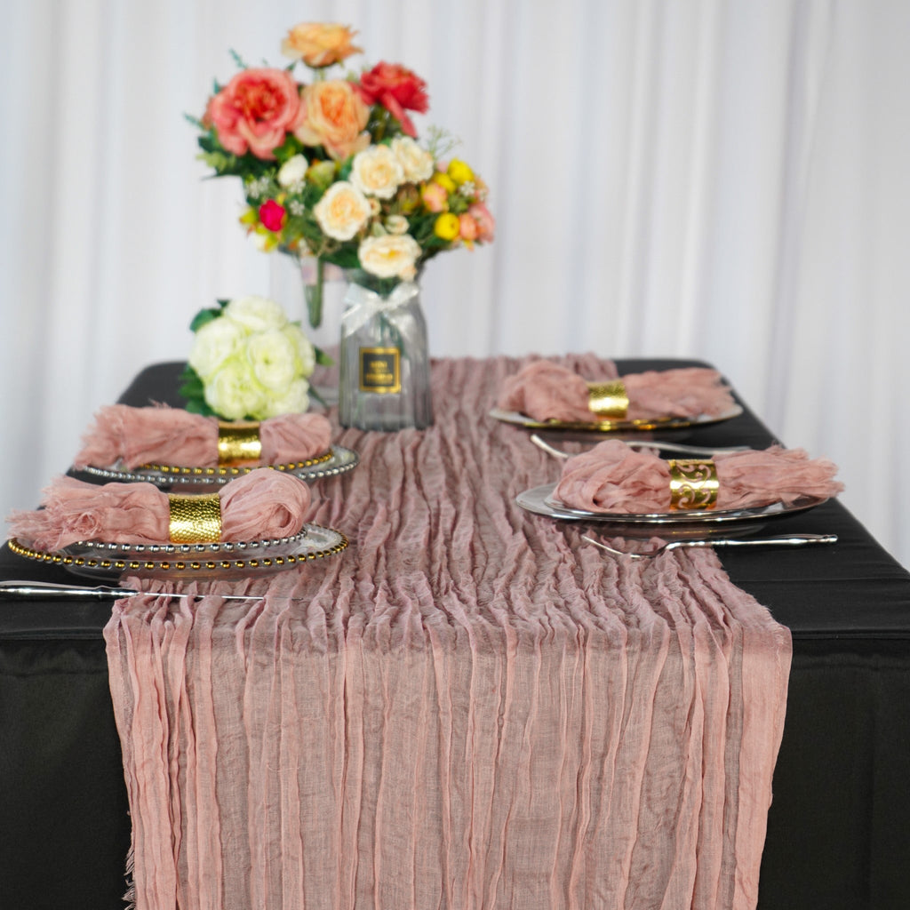 https://cdn.shopify.com/s/files/1/0042/0390/5136/products/premium-cheesecloth-table-runner-dusty-rose.jpg?v=1668461394
